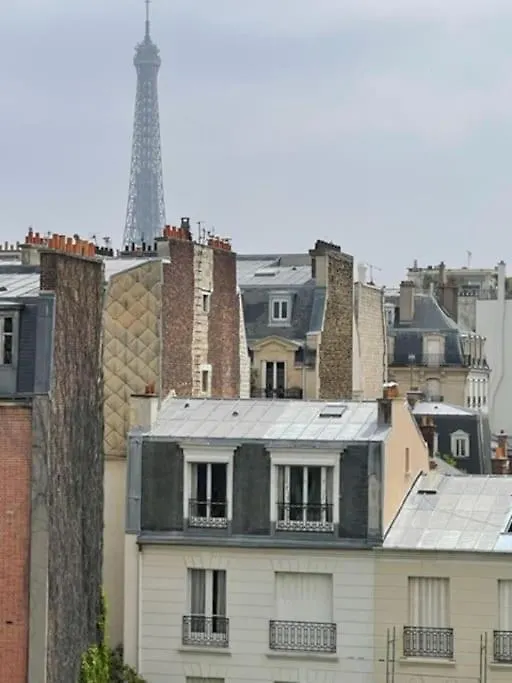 Апартаменты Calme Avec Vue Toits De Et Tour Eiffel